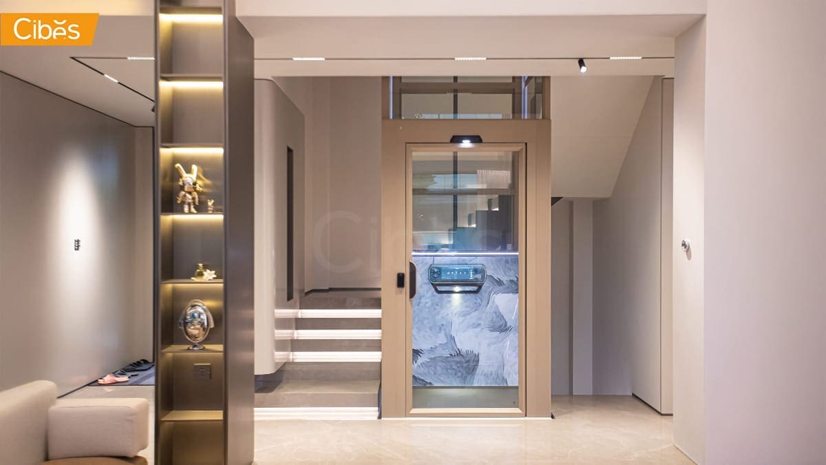 Cibes Lift – Premium Home Elevator for Modern Thai Livingroom Cibes Lift home elevator ลิฟท์บ้านหรู installed in a modern living room with glass design for luxury homes in Thailand